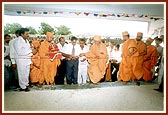 BAPS sadhus and donors perform the Vedic inauguration ceremony