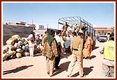 Army helps to load the essentials for border villages
