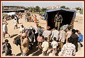 Essentials being distributed by volunteers and sadhus in various villages