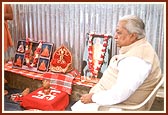 Shri Keshubhai Patel seated inside one of the shops