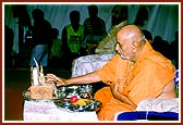 Swamishri performs pujan of the foundation bricks of earthquake-hit villages adopted by BAPS