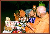 Swamishri performs pujan of the foundation bricks of earthquake-hit villages adopted by BAPS