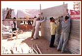 Tin shelters being prepared