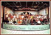 Group photo of all participants with the sadhus