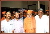 Without any distinctions of great or small, Swamishri meets some of the earthquake victims with the same intimacy and enthusiasm