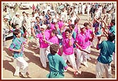 The colorful procession had troupes of tribal youths dancing and singing excitedly