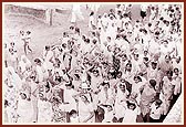 Women carrying kalashas during the Nagar Yatra