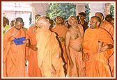 Swamishri closely looks at the details and carving of the Mandir a day before the murti-pratishtha