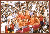 Sadhus participate by singing bhajans