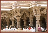 The devotees had darshan of the deities and admired the beautiful carvings and pillars of the mandir  