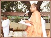 Devotees participate in the  daily personal morning puja teaching session