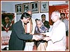 Shri Janak Dave accepts the award on behalf of the Sanstha from H.E. Shri Krishna Kant, Vice-President of India