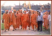 Swamishri takes a round on site