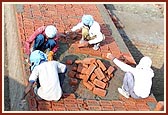 Workers and engineers are working on the site