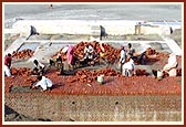 Workers and engineers are working on the site