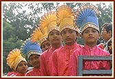 Thakorji was paraded for darshan in a colorful, devotional procession of 40 tractors and floats through the streets and outskirts of Sarangpur village