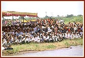 Devotees eagerly engaged in the divine darshan