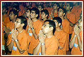 Kishores offer prayers during the shibir