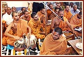 Sadhus and devotees are engaged in singing thals