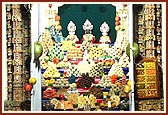 Varieties of food items offered to the murtis in each of three shrines of the main mandir