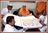 ... prasad from Amdavad and Gandhinagar mandirs in passport shape box