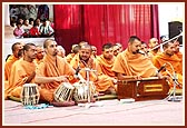 Sadhus sing bhajans during the morning puja