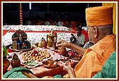 'Swamishri engaged in Chopada pujan ritual