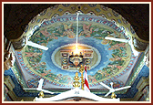The painted dome of Akshar Deri shows Shriji Maharaj playing raas with the paramanhasas