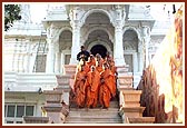 Descending the mandir steps