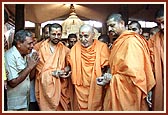 Swamishri comes out from the Smruti Mandir