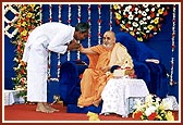 Swamishri blesses Shri Vanmalidas for a publication of bhajans composed by him