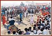 A group of mounted horses perform an entertaining routine during the procession