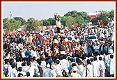 A dance troupe create a human pyramid as the crowd applaud in appreciation