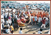 A performer dressed in a traditional camel outfit