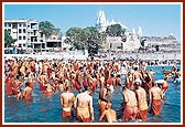 Sadhus bathe in the holy river Ghela after Swamishri's departure 