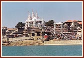 A view of the Gadhada Mandir and front gateway from across the river Ghela 