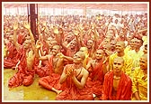 Swamishri finally sprays the colored water on all the sadhus