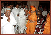 After the assembly Swamishri meets political leaders inside the main monument