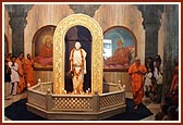 Swamishri performs pradakshina of Yogiji Maharaj's murti in Yogi Smruti Mandir
