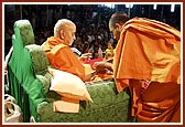 Kankan Bhandhanam ... a nada chhadi is tied to Swamishri's wrist