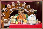 Punyah Vachanam: Swamishri holds the kalash
