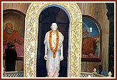 Swamishri circumambulating the murti of Yogiji Maharaj