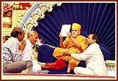 Swamishri releases the birthday celebration souvenir