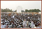 Devotees take thier seats prior to the start of the celebration program