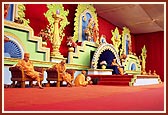 Swamishri on stage with the senior sadhus