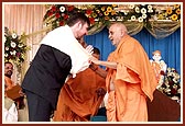 Hon. Barry Gardiner is blessed by Swamishri