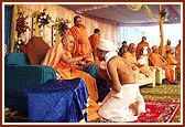 Swamishri applies chandan and gives the guru mantra