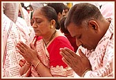 Devotees perform yagna rituals