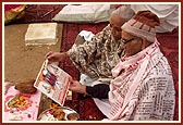 Devotees perform yagna rituals