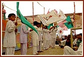 Balaks sing and dance with flags and banners during the kick-off ceremony